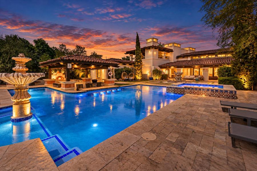 Pool courtyard and estate at twilight, Valley Vista Estate